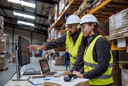 an image of two workers